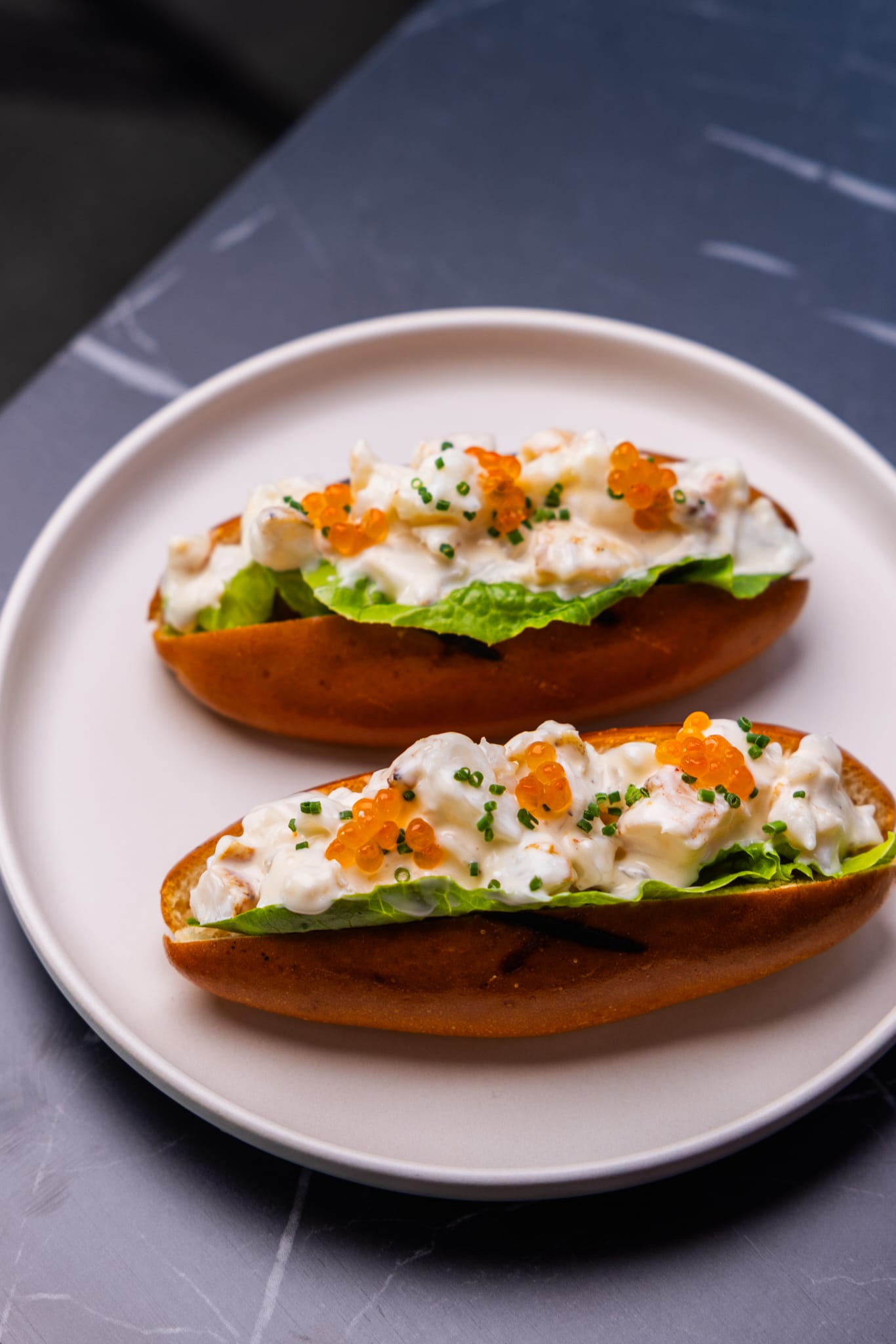 Lobster roll with roe and chive