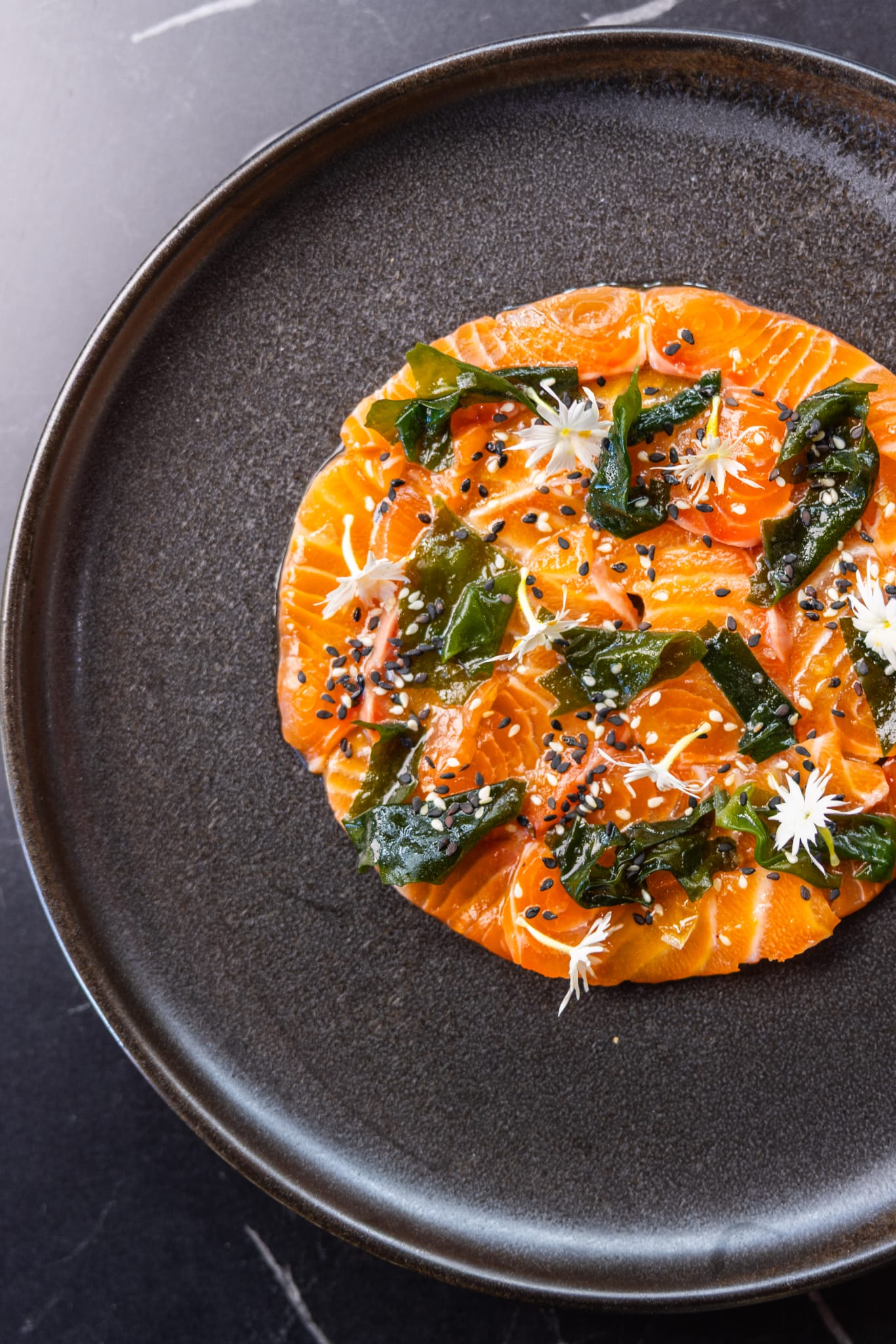 Cured salmon with seaweed and native flowers